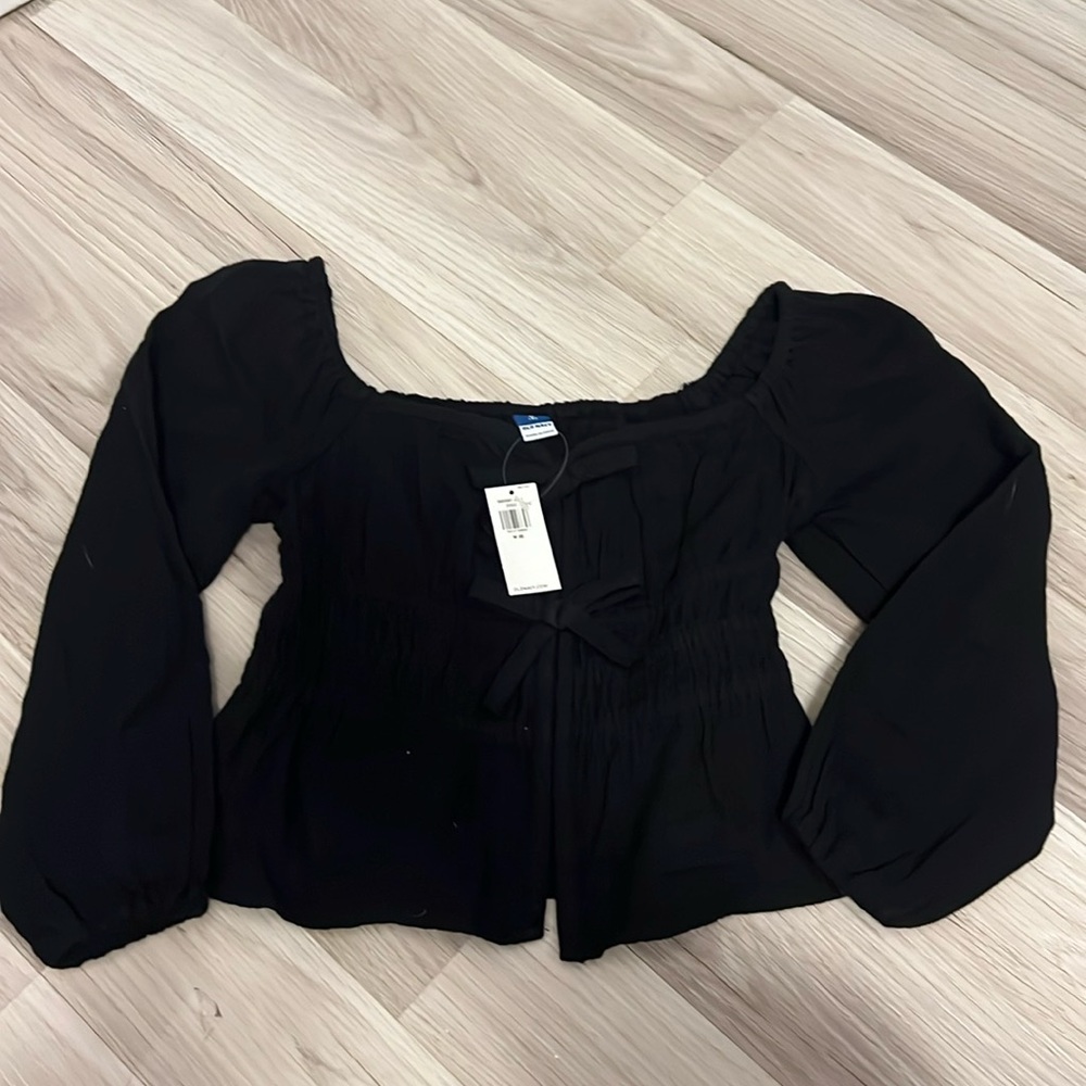 Crooked black top